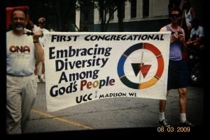 Photo of The First Congregational Church UCC was the first church in Madison to have a sign plus a gang of supporters in Gay Rights Parade. (1996)