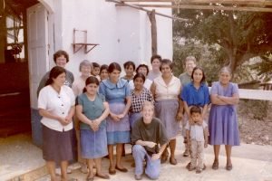 Photo of The women, wives of the men building the pigsty, requested a separate meeting with the women on our team. They discussed organizing a cooperative Tienda (small market) that would eliminate having to walk three miles each way to the nearest Tienda. (1998)