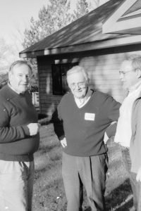 photo of the UCC/EKU Working Group Professor M. Douglass Meeks (God the Economist), Professor Frederick Herzog (Justice Church) and Kittlaus (Organizing Justice Church) at a meeting. (1986)