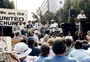 Photo of 1983. Paul Kittlaus addresses UCC participants in a peace rally in Washington DC.
